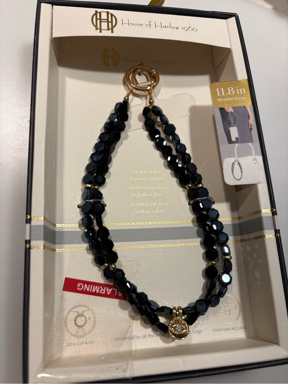 House of Harlow 1960 Blue Beaded Phone Wristlet with Gold Charm
